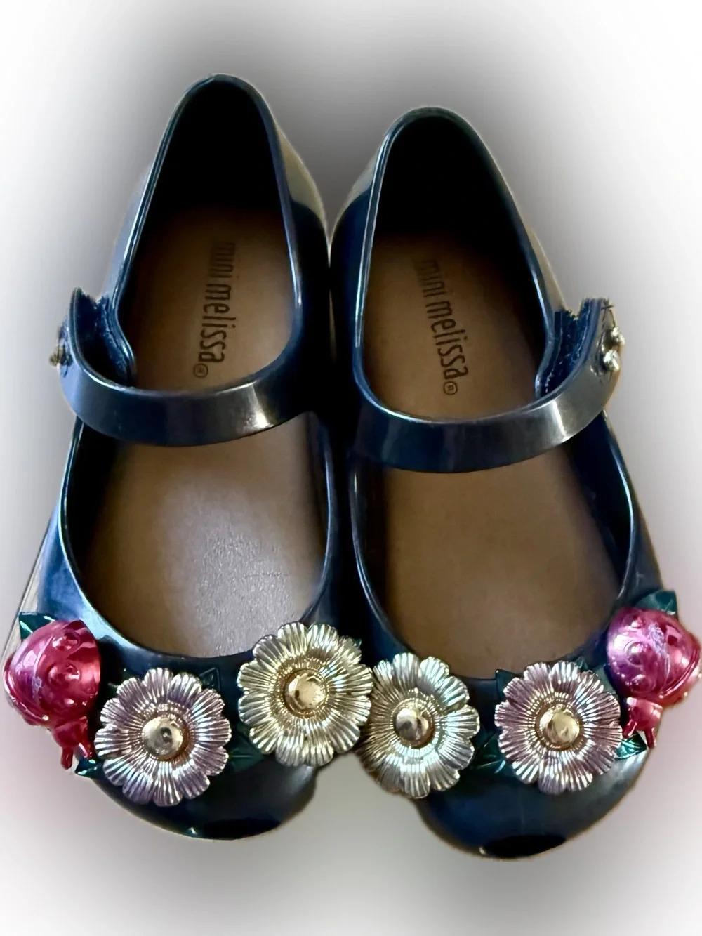 Mini Melissa Black Mary Jane with Metallic Flower Accents